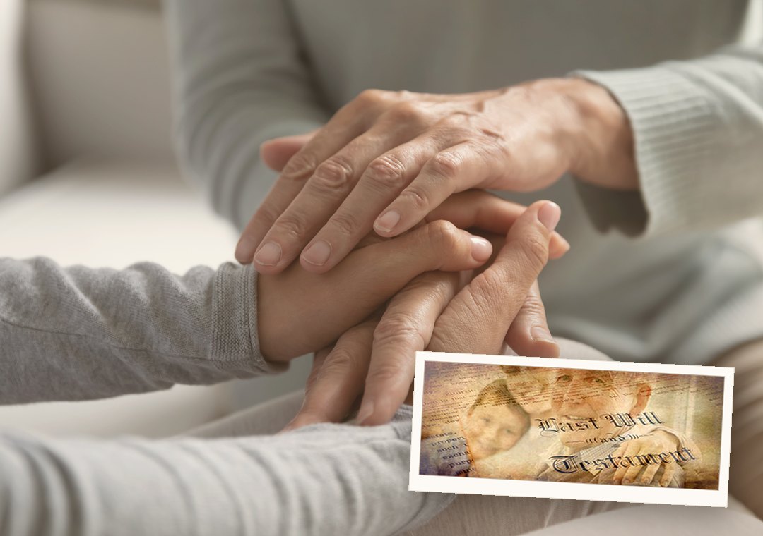 An older parent and an adult child holding hands, with a last will and testament keepsake laid over the photo